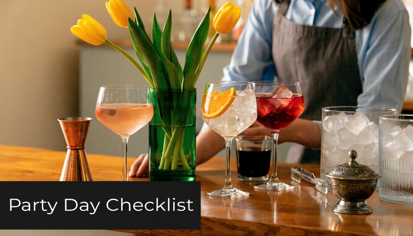 A professional bartender preparing a variety of cocktails behind a bar for a social gathering.
