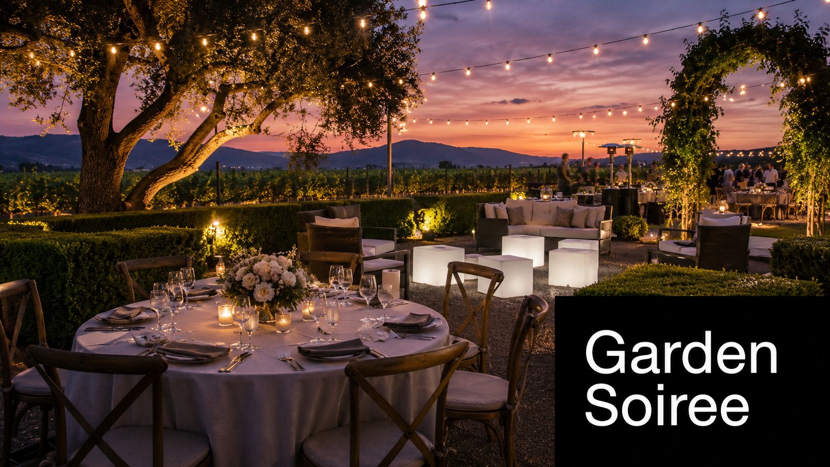 An elegant outdoor dinner setup at a winery during a sunset event for a 50th birthday celebration.
